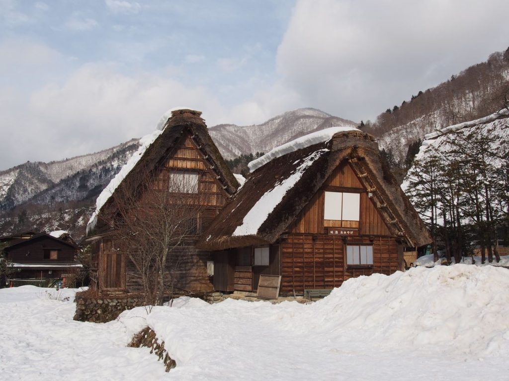 Explore the snow-covered Gassho-Zukuri houses in Shirakawa, Japan's UNESCO heritage site.